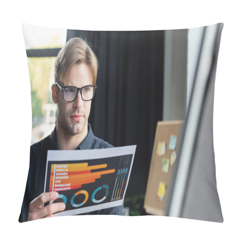 Personality  Young Programmer Holding Document Near Blurred Flip Chart In Office  Pillow Covers