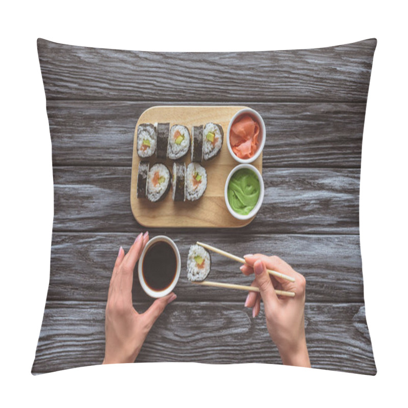 Personality  Cropped Shot Of Person Holding Chopsticks And Eating Delicious Sushi Roll  Pillow Covers