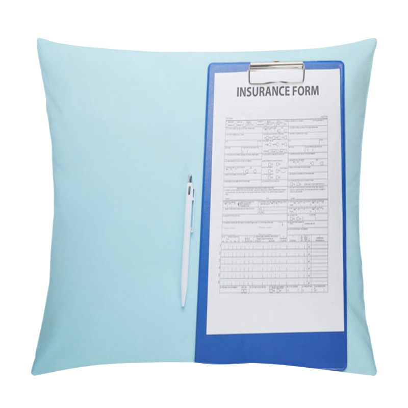 Personality  Top View Of Insurance Form On Clipboard And Pen Isolated On Blue  Pillow Covers