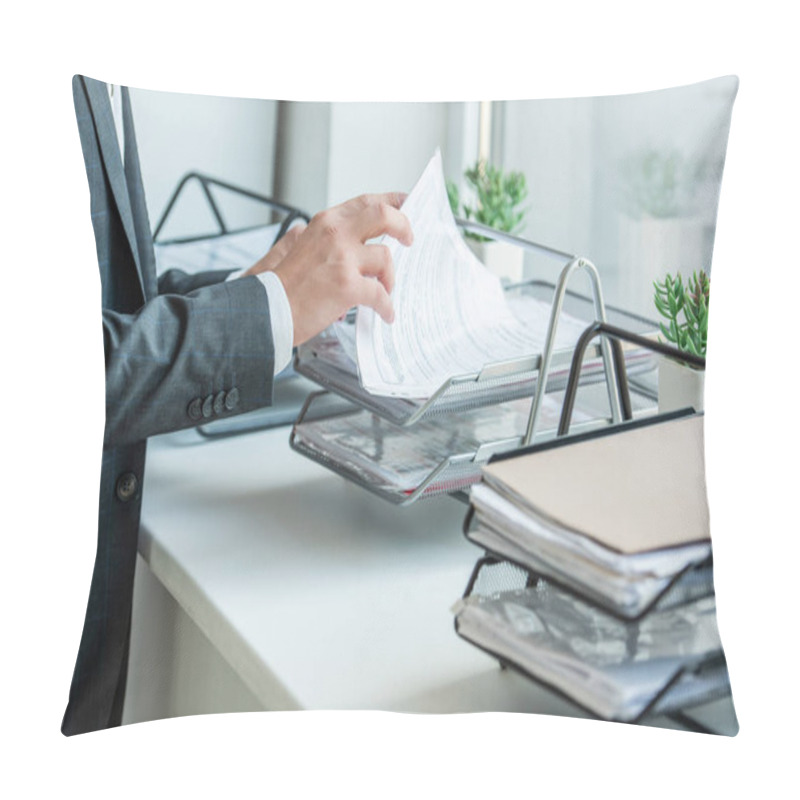 Personality  Cropped View Of Businessman Looking For Paper In Document Tray, While Standing Near Window Pillow Covers