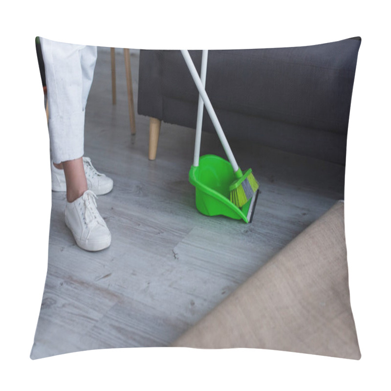 Personality  Cropped View Of Woman In White Sneakers Near Broom And Scoop At Home Pillow Covers