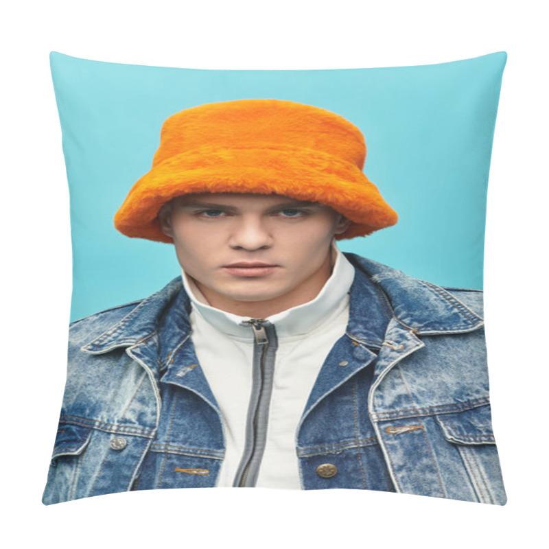 Personality  Handsome Young Man Showcases A Stylish Orange Hat, Dressed In Denim, Against A Bright Blue Backdrop. Pillow Covers