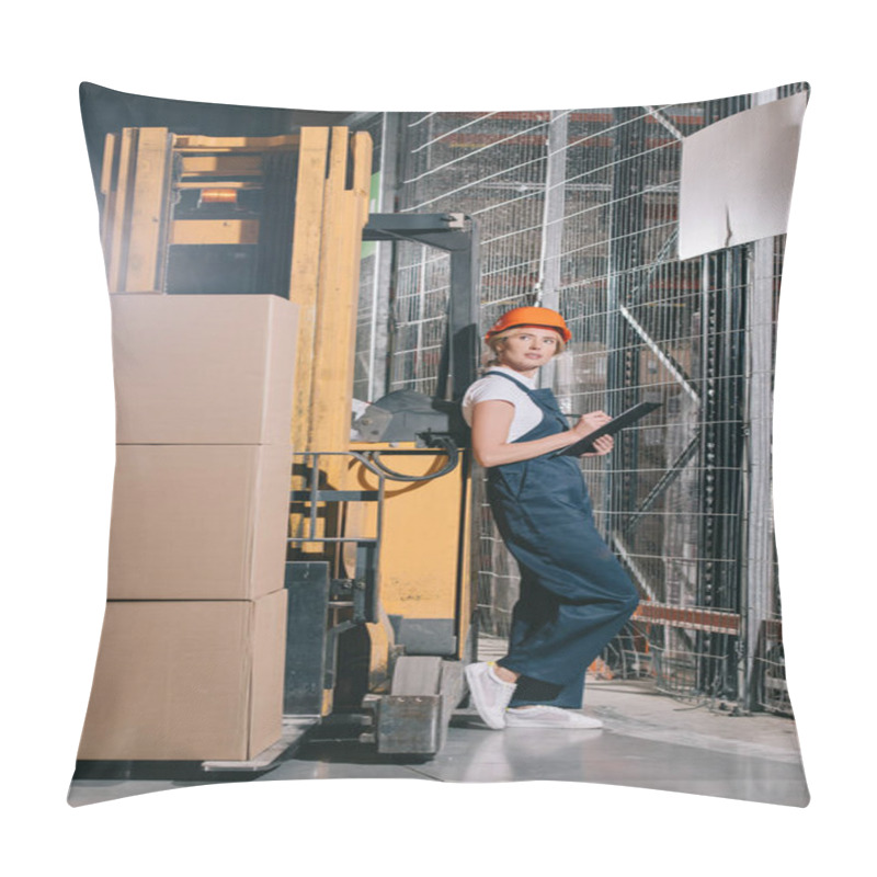 Personality  Attractive Workwoman Writing On Clipboard And Looking Away While Standing Near Forklift Loader Pillow Covers