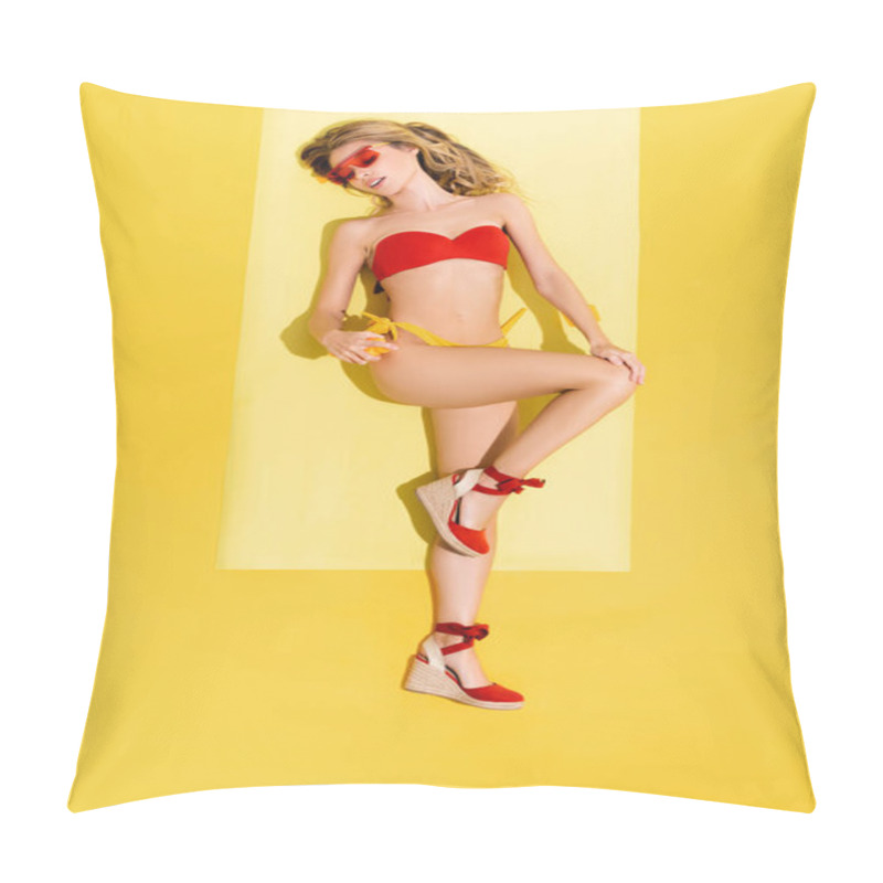 Personality  Top View Of Sensual Woman Applying Sunscreen While Lying On Beach Mat On Yellow Pillow Covers