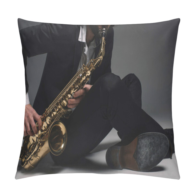 Personality  Cropped Shot Of Musician Playing Saxophone While Sitting On Floor Pillow Covers