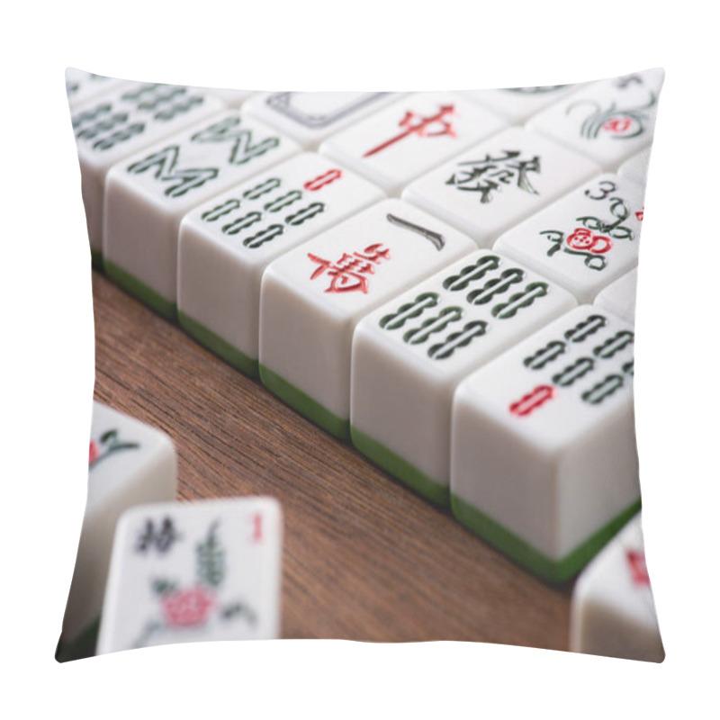 Personality  KYIV, UKRAINE - JANUARY 30, 2019: Selective Focus Of White Mahjong Game Tiles With Signs And Characters On Wooden Table Pillow Covers