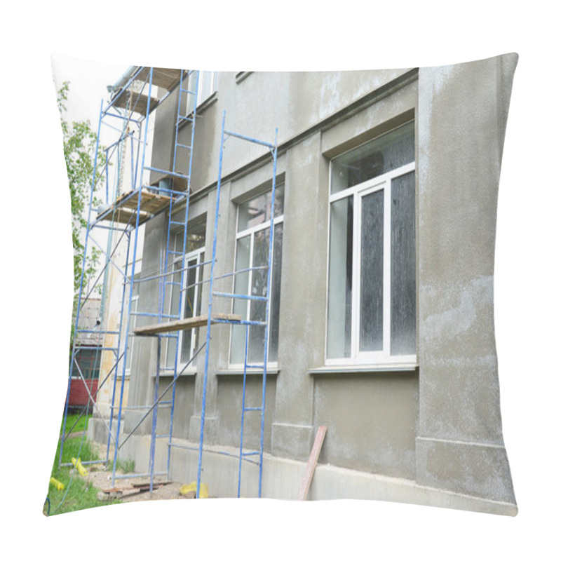 Personality  Renovating The Facade Of A Building By Applying Stucco Finish, Plastering And Finishing The Exterior Walls Using Scaffold Or Staging.  Pillow Covers