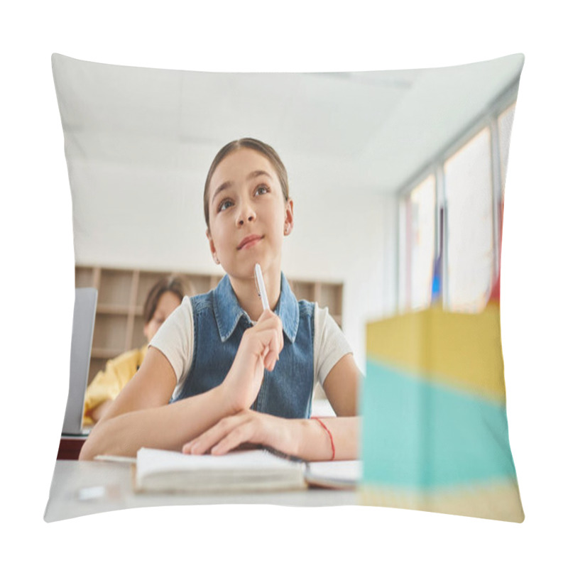 Personality  A Young Girl Sitting At A Desk, Deep In Thought, Holds A Pen, Surrounded By A Vibrant Classroom Pillow Covers