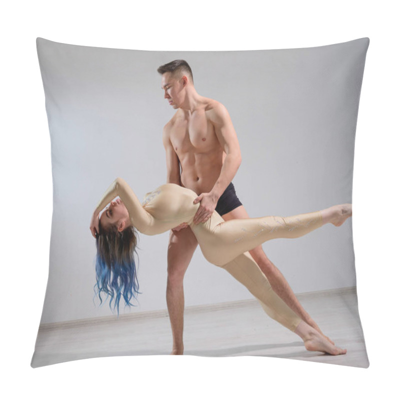 Personality  Acrobatic Couple Perform Number On A White Background. A Duet Of Gymnasts Rehearsing A Performance With Support. A Man And A Very Flexible Woman Are Dancing. Pillow Covers