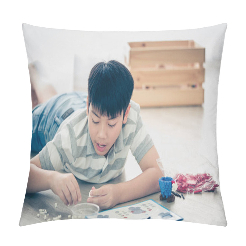 Personality  Happy Asian Boy Lying And Playing Plastic Block At Home Pillow Covers