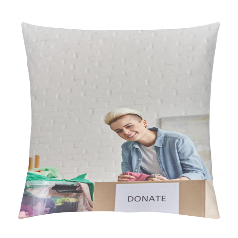 Personality  Young And Joyful Woman With Trendy Hairstyle Holding Pre-loved Clothes And Looking At Camera Near Plastic Container And Donation Box At Home, Sustainable Living And Social Responsibility Concept Pillow Covers