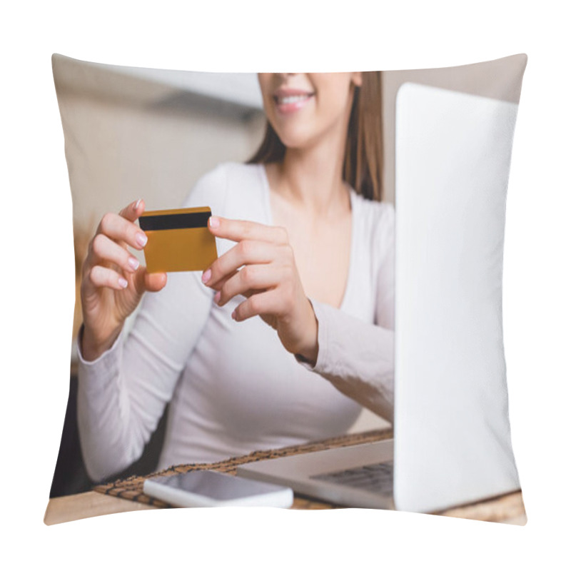 Personality  Cropped View Of Happy Girl Holding Credit Card Near Laptop And Smartphone On Table  Pillow Covers