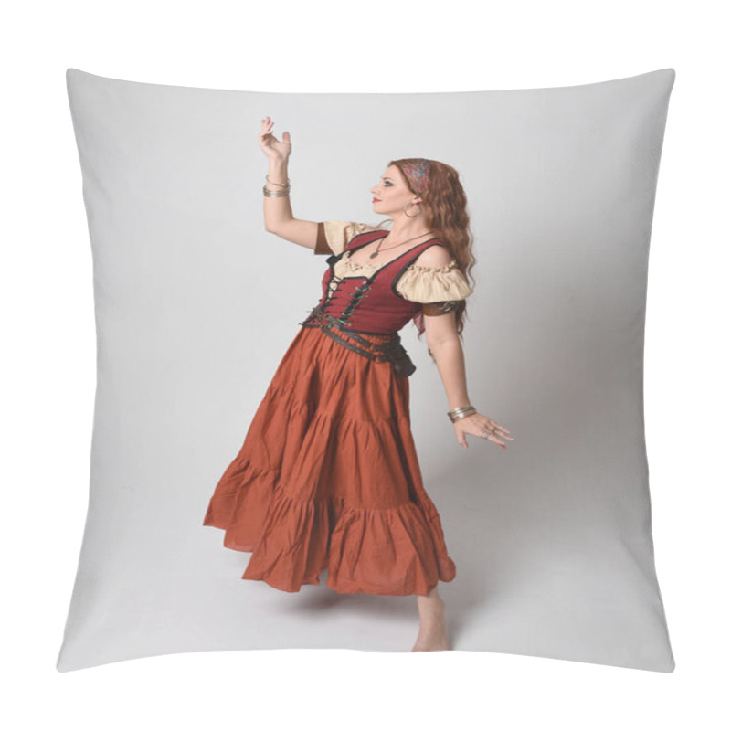 Personality  Full Length Portrait Of Beautiful Red Haired Woman Wearing A Medieval Maiden, Fortune Teller Costume. Standing Pose With Dancing Gestures, Twirling Skirt. Isolated On Studio Background. Pillow Covers