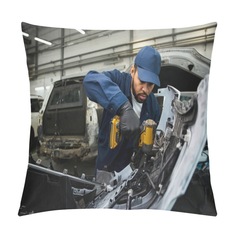 Personality  Young Mechanic Focuses Intently While Repairing Car Parts In A Bustling Auto Repair Shop. Pillow Covers