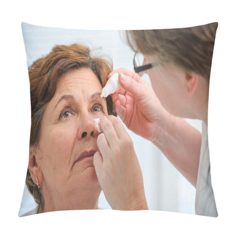 Personality  Senior Woman Applying Eye Drops Pillow Covers