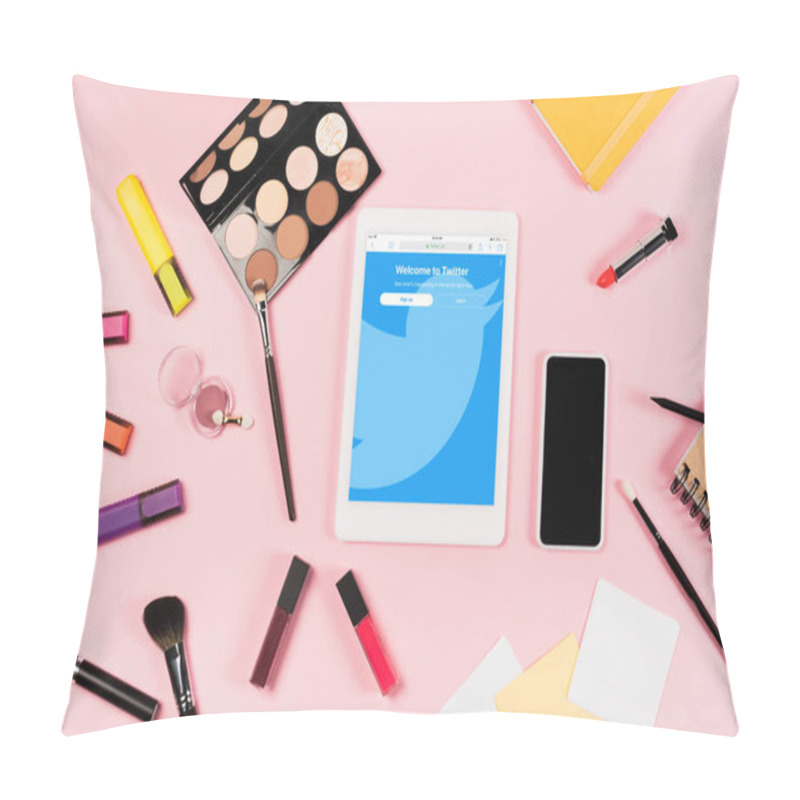 Personality  KYIV, UKRAINE - MAY 11, 2019: Top View Of Digital Tablet With Twitter App On Screen, Smartphone With Blank Screen, Highlighters And Decorative Cosmetics On Pink Pillow Covers