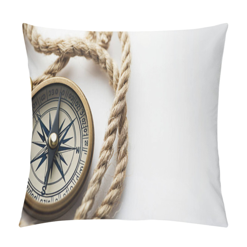 Personality  Classic Compass With A Brass Finish Entwined By A Thick Rope On A White Surface. Pillow Covers