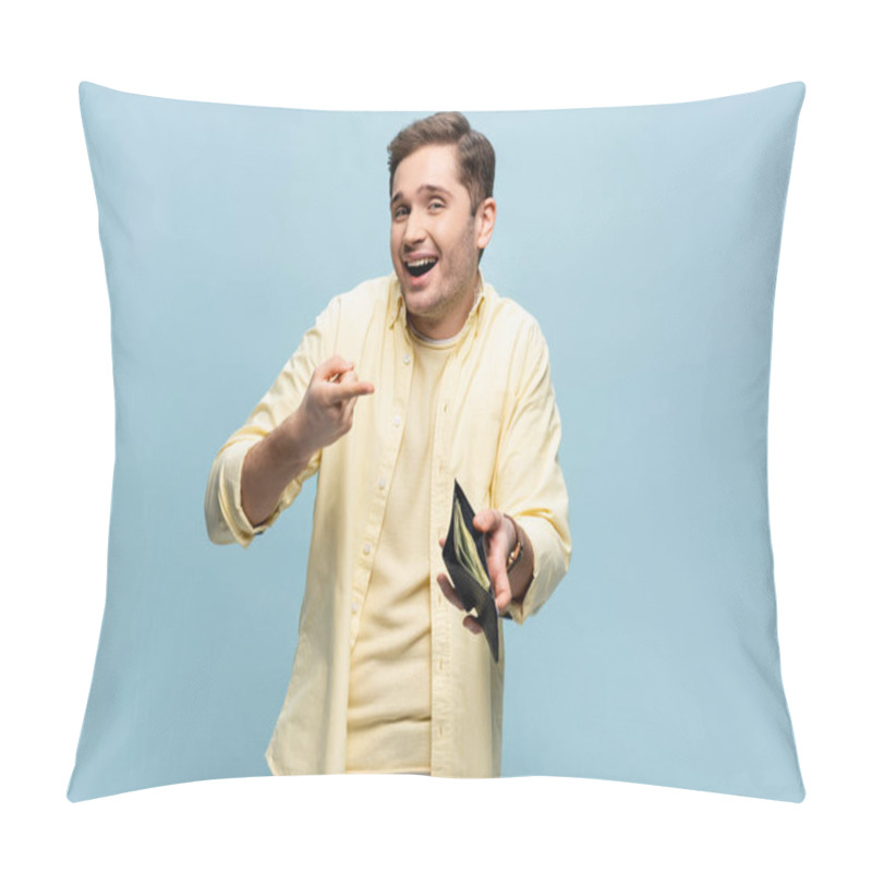 Personality  Amazed Young Man In Yellow Shirt Pointing With Finger At Wallet With Dollars Isolated On Blue Pillow Covers