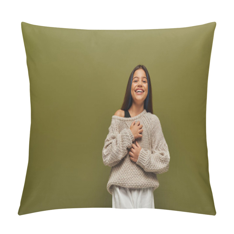 Personality  Cheerful Preteen Girl In Stylish Knitted Sweater And Casual Outfit Touching Chest While Looking At Camera And Standing Isolated On Green, Contemporary Fashion For Preteen Concept  Pillow Covers