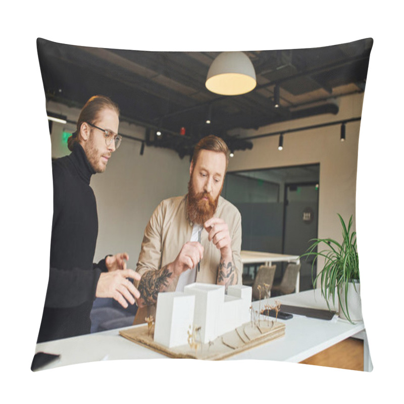 Personality  Thoughtful, Tattooed And Bearded Architect Looking At Building Model Near Colleague In Black Turtleneck While Working On Startup Project In Modern Design Studio, Architecture And Business Concept Pillow Covers