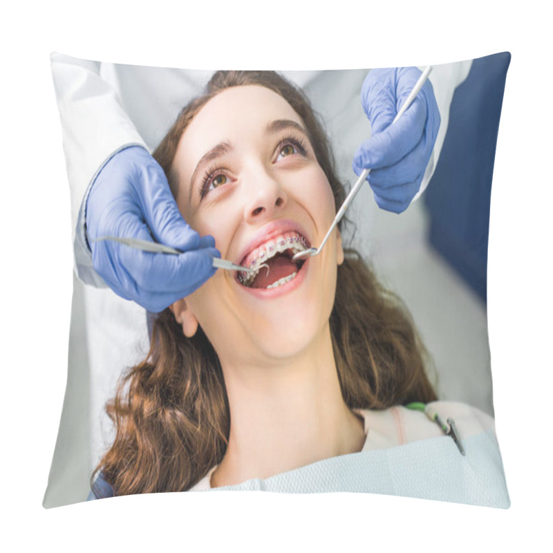 Personality  Cropped View Of Dentist In Latex Gloves Examining Cheerful Woman In Braces With Opened Mouth  Pillow Covers