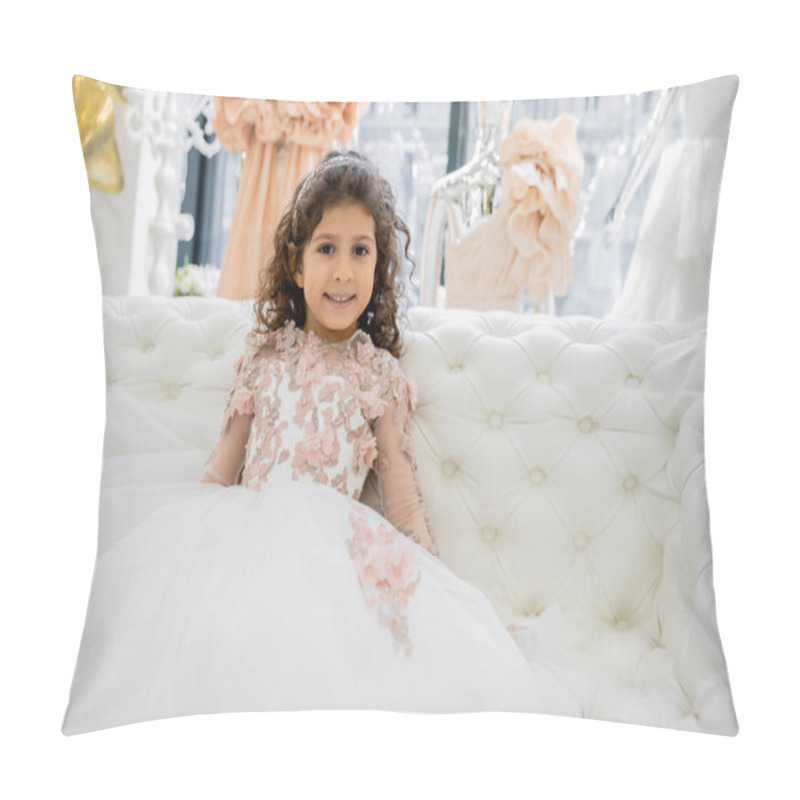 Personality  Cheerful Middle Eastern Girl With Curly Hair Sitting In Floral Dress On White Couch And Smiling Inside Of Luxurious Wedding Salon, Smiling Kid, Tulle Skirt, Blurred Background  Pillow Covers