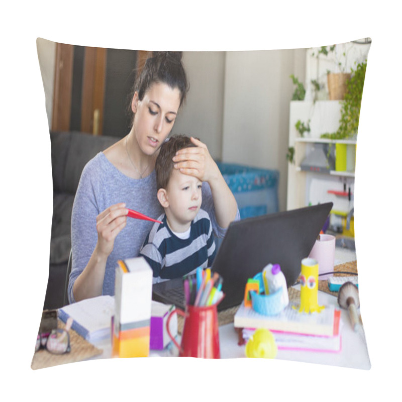 Personality  Busy Mother Telecommuting And Caring For Her Sick Child. Concerned Woman Measuring Her Son's Fever With A Thermometer At Home. Pillow Covers