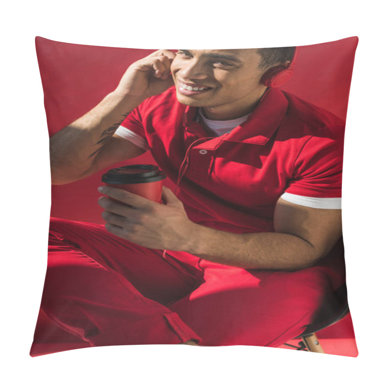 Personality  Stylish Mixed Race Man In Headphones Sitting, Holding Coffee To Go And Talking On Smartphone On Red Pillow Covers