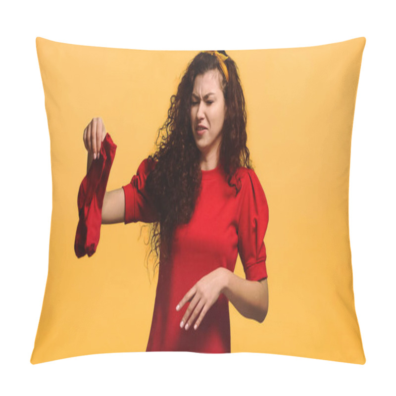 Personality  Displeased Woman Grimacing While Holding Stinky Socks Isolated On Orange Pillow Covers