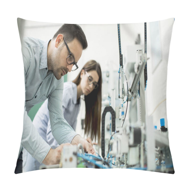 Personality  Young Couple Of Students Working At Robotics Lab Pillow Covers