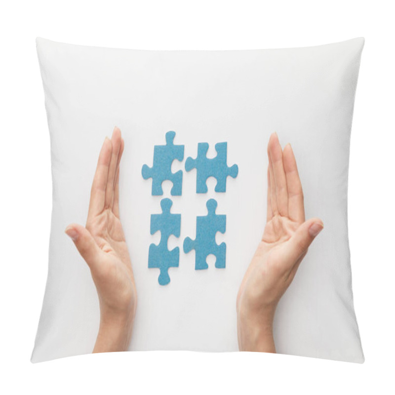 Personality  Cropped View Of Woman Hands Near Pieces Of Blue Jigsaw Puzzle On White Background Pillow Covers