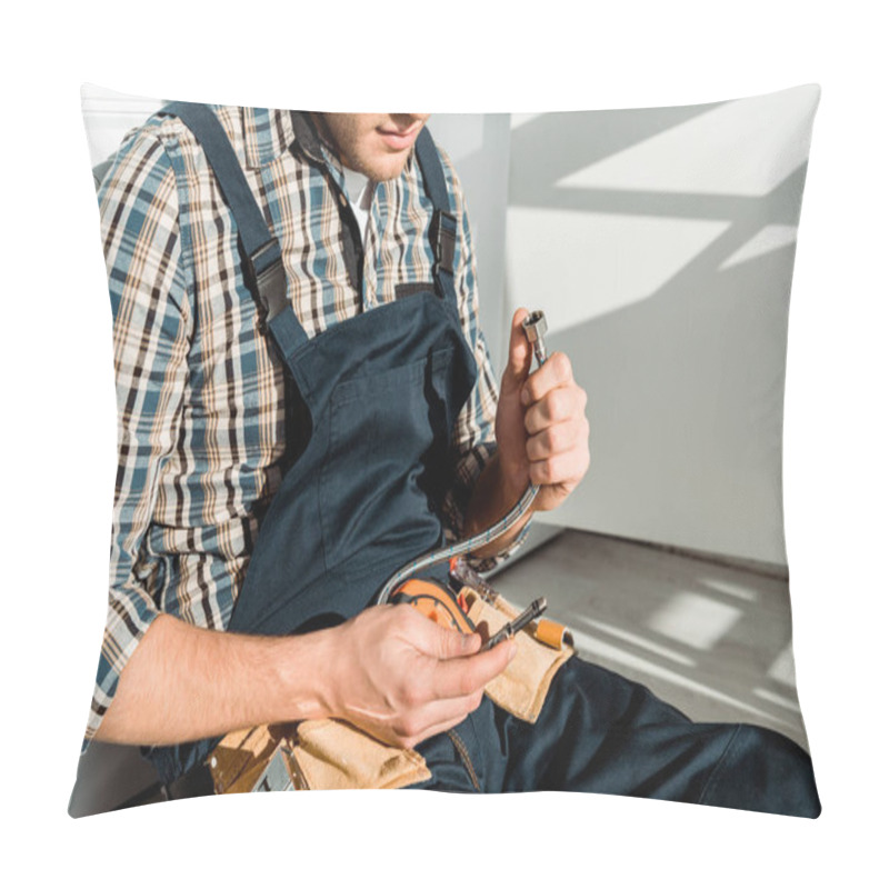 Personality  Cropped View Of Installer Holding Metal Hose Pillow Covers