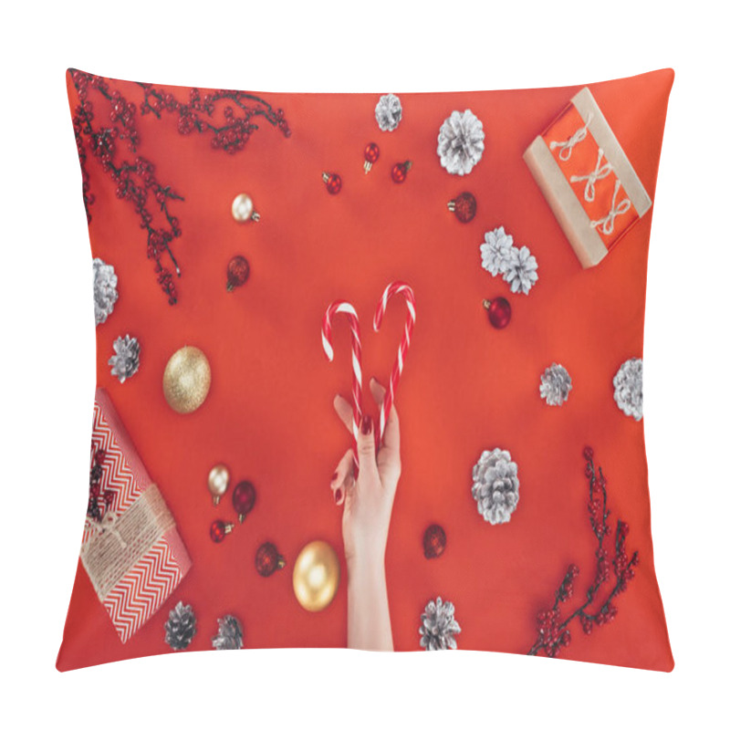 Personality  Hand With Candy Canes At Christmastime Pillow Covers