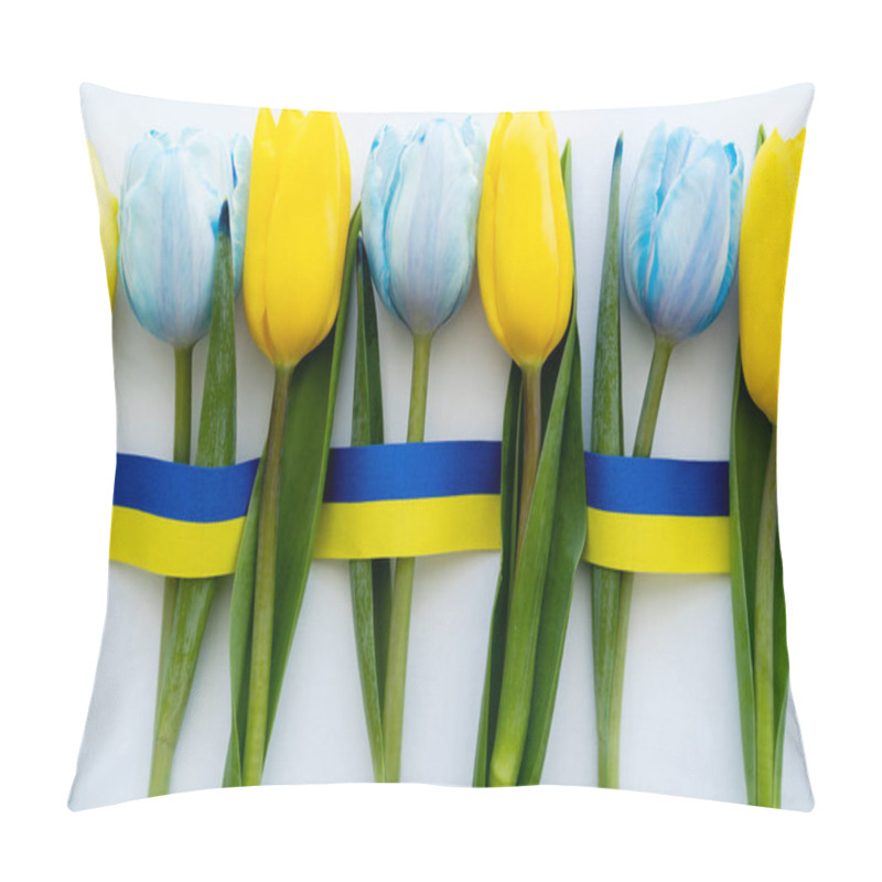 Personality  Top View Of Tulips Near Blue And Yellow Ribbon On White Background  Pillow Covers