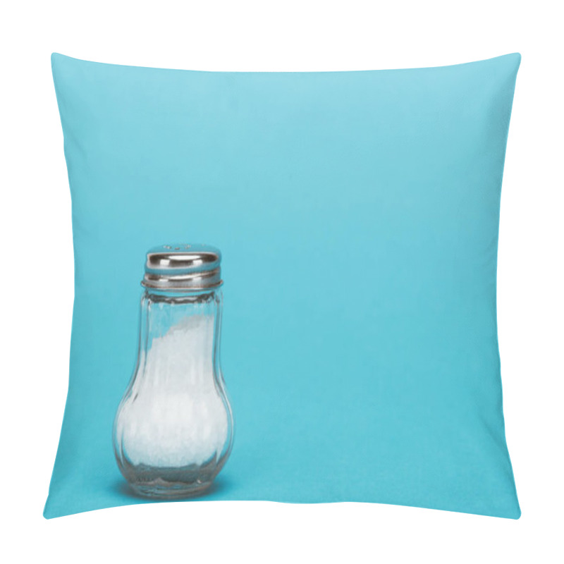 Personality  Glass Salt Shaker Full Of Salt On Blue Background With Copy Space Pillow Covers