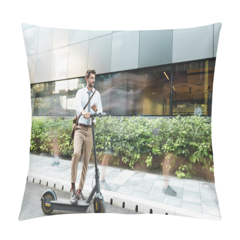 Personality  Motion Blur Of Businessman Holding Smartphone While Standing Near E-scooter, Plants And Building  Pillow Covers