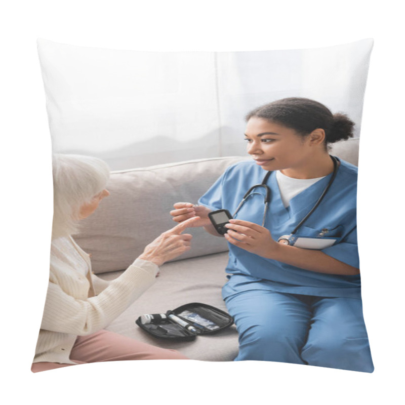 Personality  Brunette Multiracial Nurse In Uniform Holding Test Strip And Glucometer Near Senior Woman  Pillow Covers