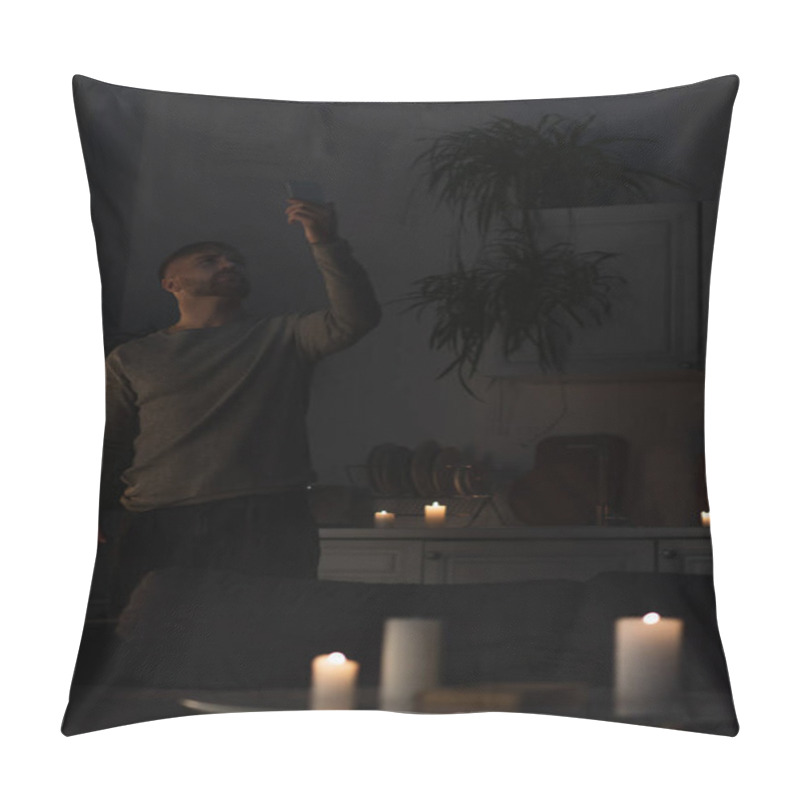 Personality  Man Looking At Smartphone In Raised Hand While Searching For Mobile Connection During Power Outage Pillow Covers