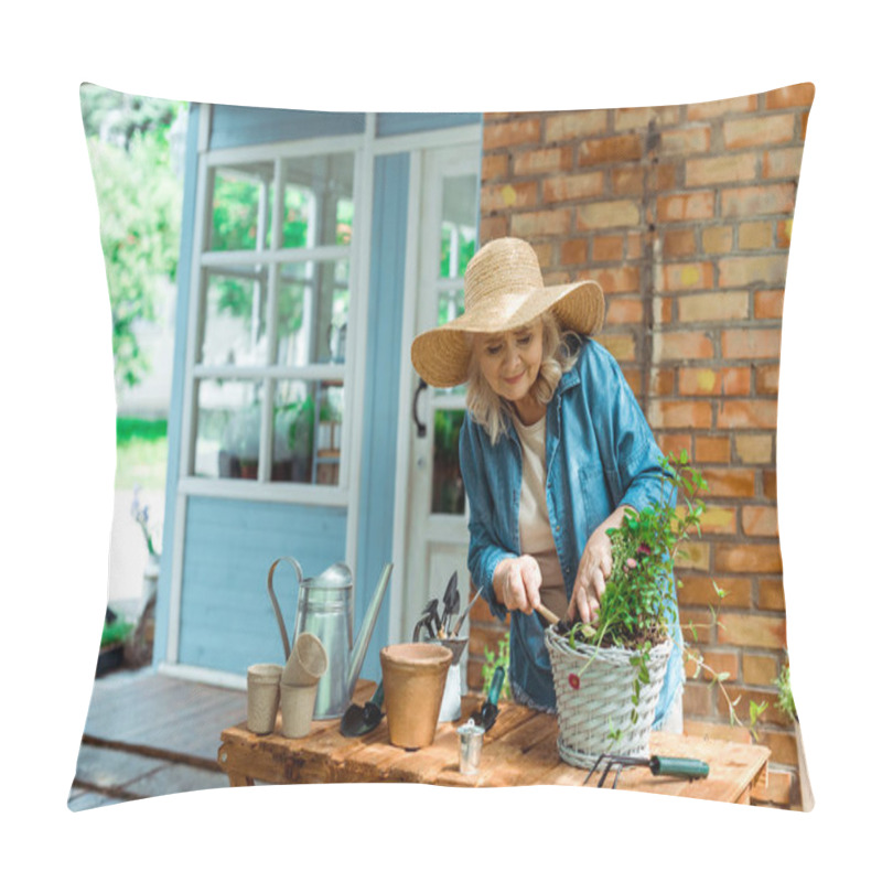 Personality  Cheerful Senior Woman In Straw Hat Holding Shovel Near Plant   Pillow Covers