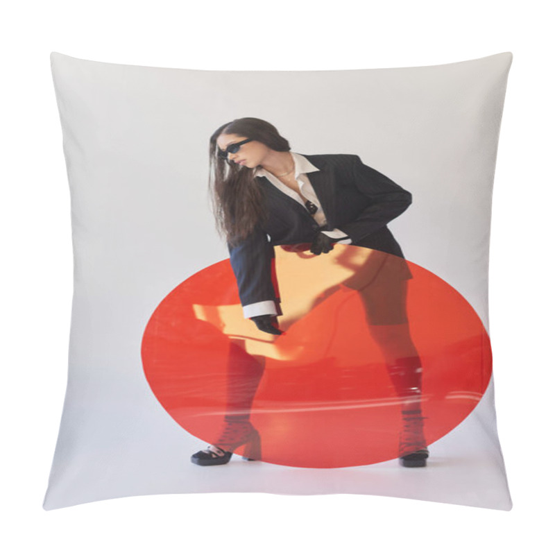 Personality  Attractive Asian Model In Stylish Look And Sunglasses Posing Holding Red Round Shaped Glass, Grey Background, Blazer And Latex Shorts, Youthful And Modern Woman, Edgy Style, Studio Photography  Pillow Covers