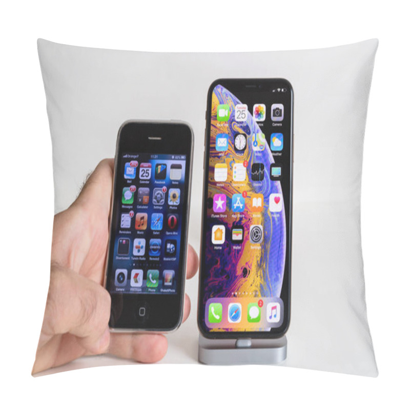 Personality  PARIS, FRANCE - SEP 25, 2018: Male Hand Compare New IPhone Xs And Xs Max Smartphone Model By Apple Computers Close Up With Vintage IPhone 3GS From 2008 Pillow Covers