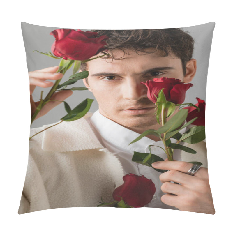 Personality  Portrait Of Man In White Jacket And Silver Finger Ring Looking At Camera And Holding Red Roses Isolated On Grey Pillow Covers