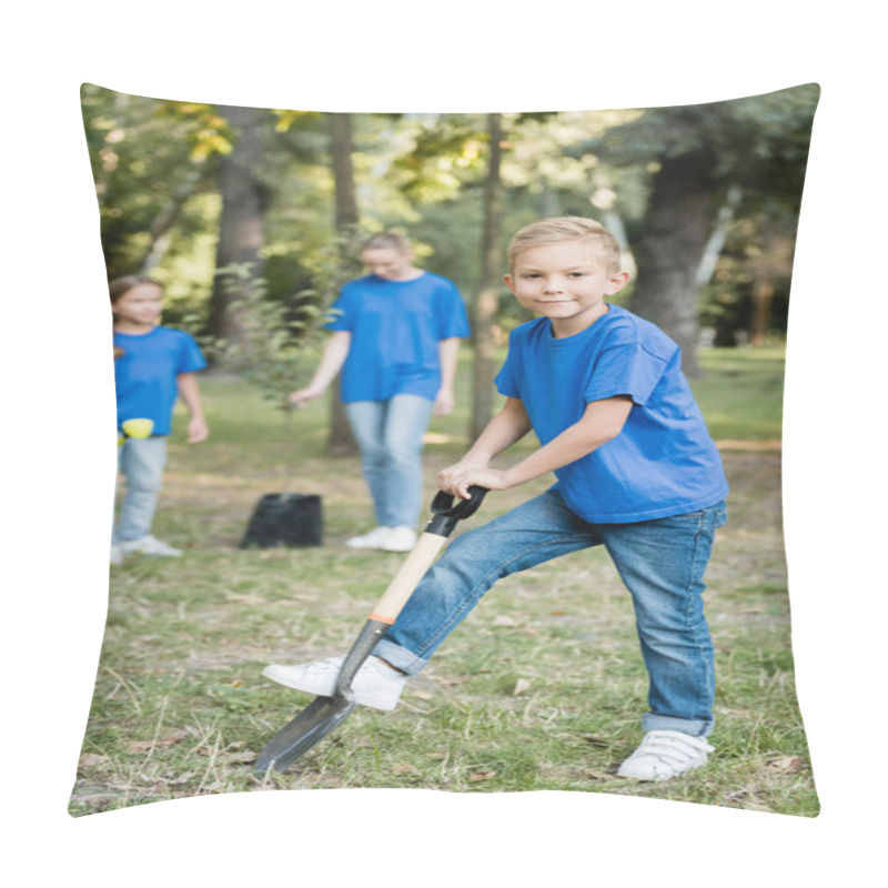 Personality  Boy Digging Ground With Shovel Near Mother And Sister With Watering Can And Young Seedling On Blurred Background, Ecology Concept Pillow Covers