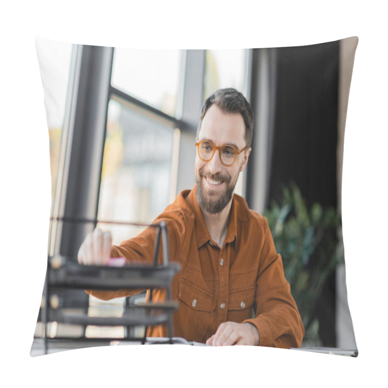 Personality  Successful And Fashionable Corporate Manager In Stylish Shirt And Eyeglasses Sitting At Workplace Near Notebook And Blurred Documents Tray At Workplace In Office Pillow Covers