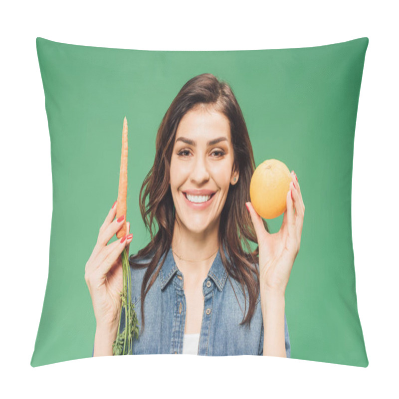 Personality  Smiling Woman In Denim Holding Orange And Carrot Isolated On Green Pillow Covers