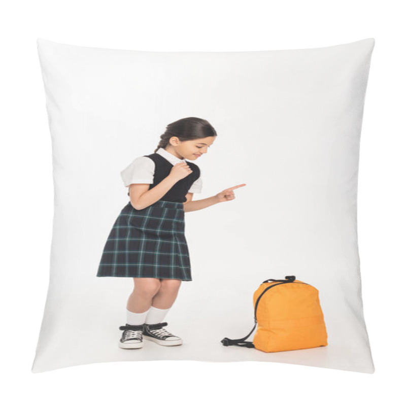 Personality  Happy Girl In School Uniform Standing And Looking At Backpack On White Background, Pointing Away Pillow Covers