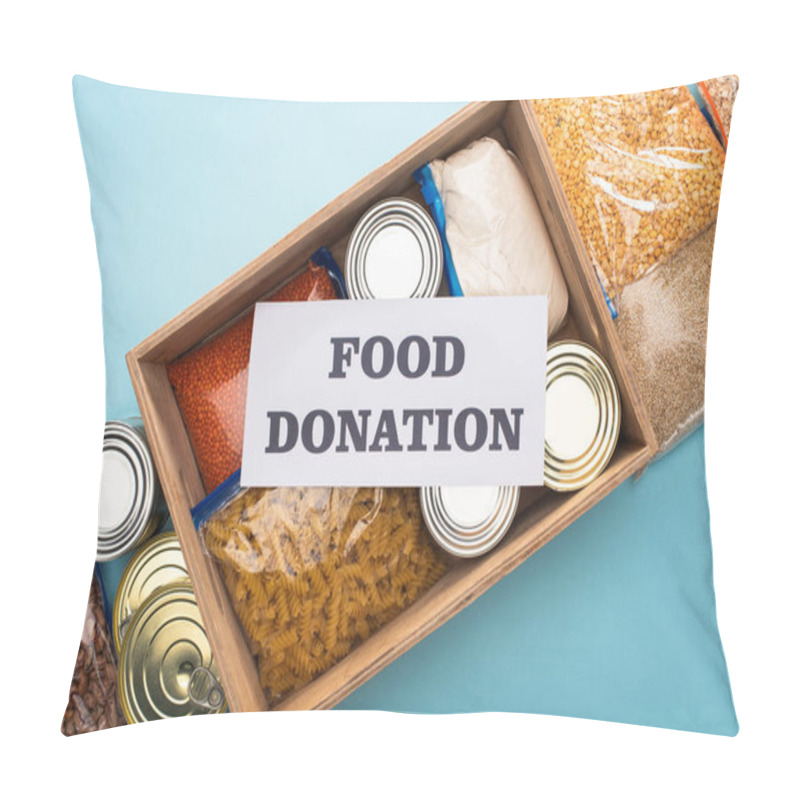 Personality  Top View Of Cans And Groats In Zipper Bags In Wooden Box Near Card With Food Donation Lettering On Blue Background Pillow Covers