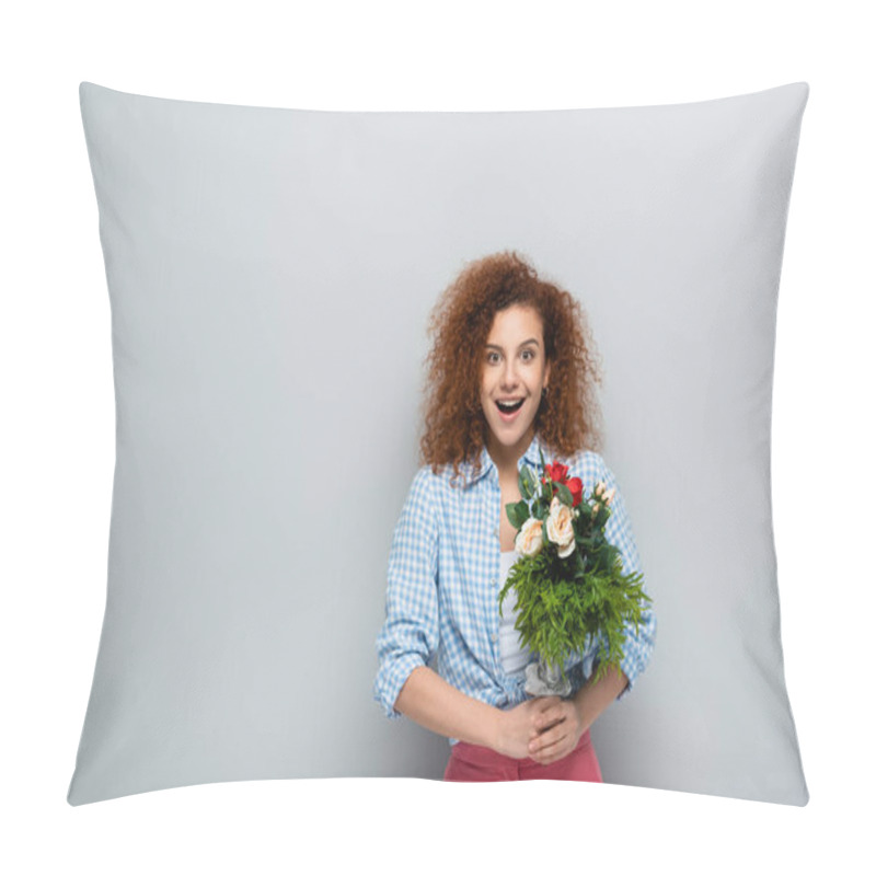 Personality  Amazed Woman Looking At Camera While Holding Flowers On Grey Background Pillow Covers