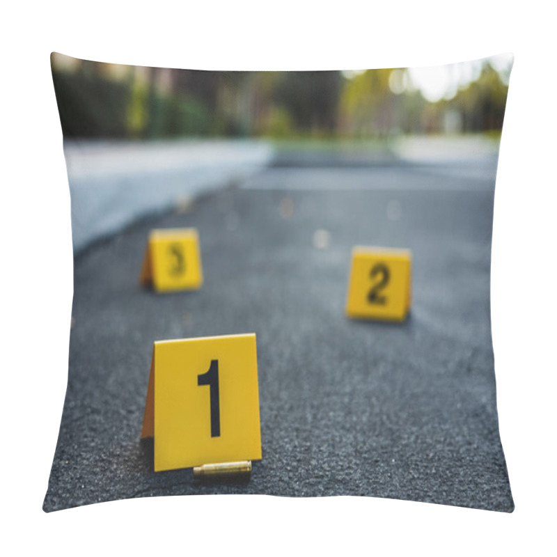 Personality  A Group Of Yellow Crime Scene Evidence Markers On The Street After A Gun Shooting Brass Bullet Shell Casing Rifle Pillow Covers