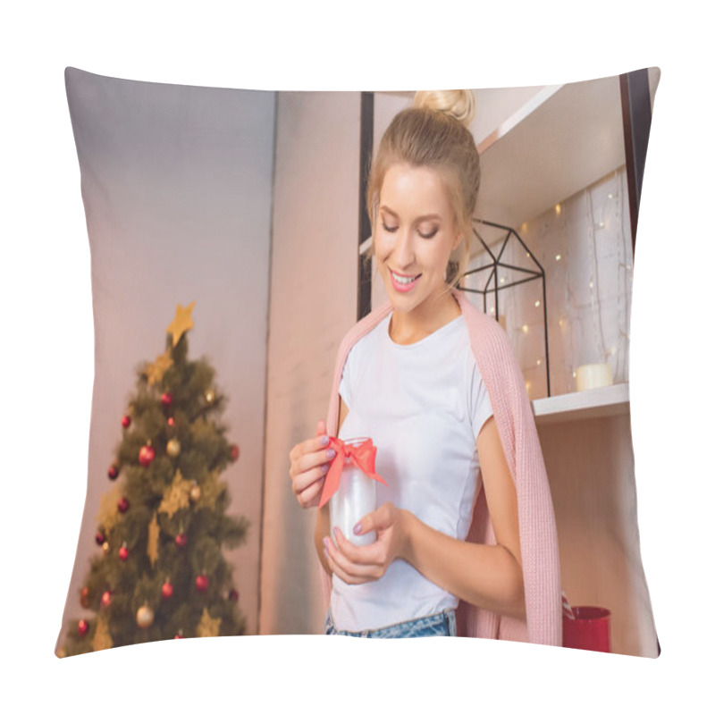 Personality  Smiling Young Blonde Woman Holding Candle With Red Ribbon At Christmas Time Pillow Covers